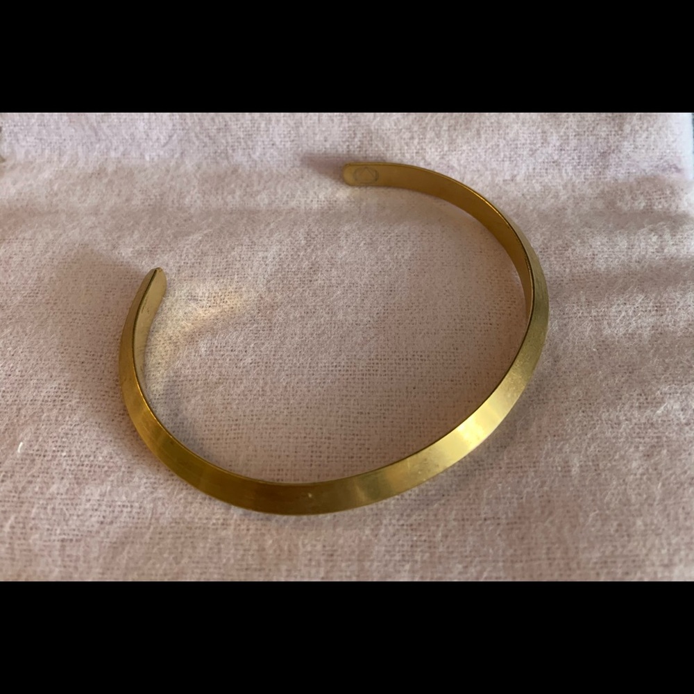 Executive Society gold cuff style bracelet